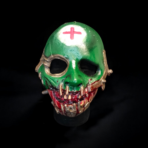 A Halloween mask of a bloody medic.