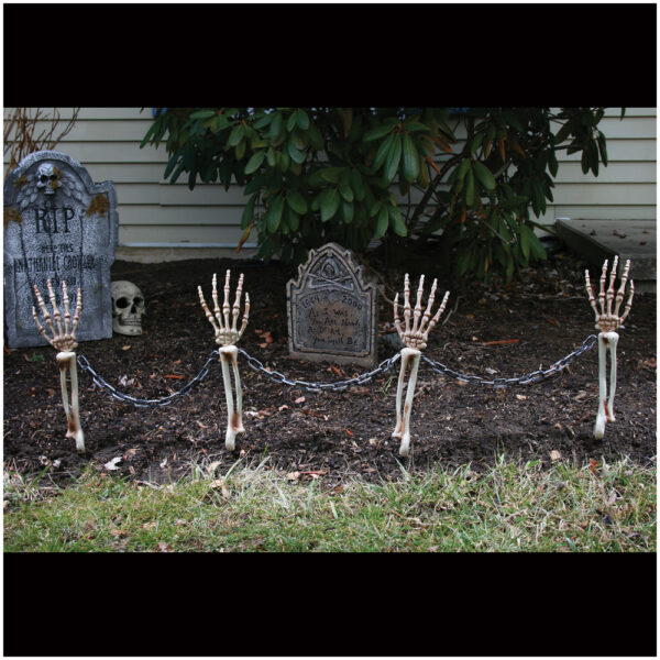 halloween decorations - skeleton arms fencing