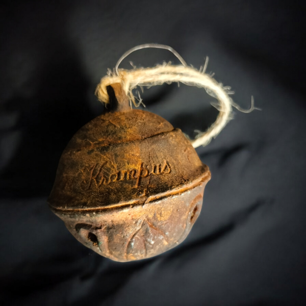 A Krampus bell hanging Christmas decoration.