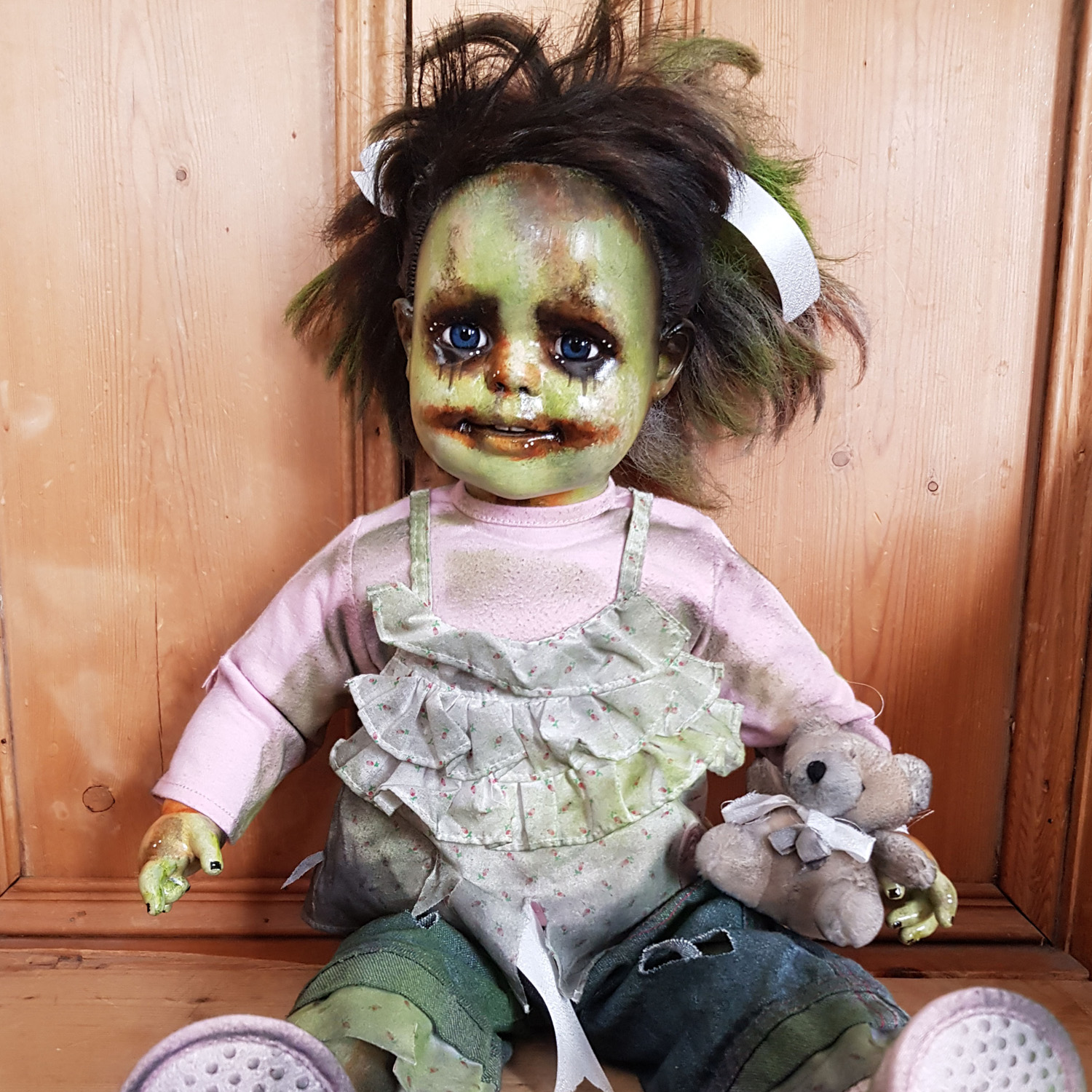 Scary best sale doll toy