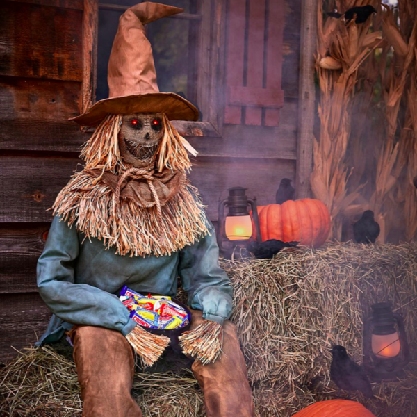 Spirit Halloween scary sitting scarecrow animated prop