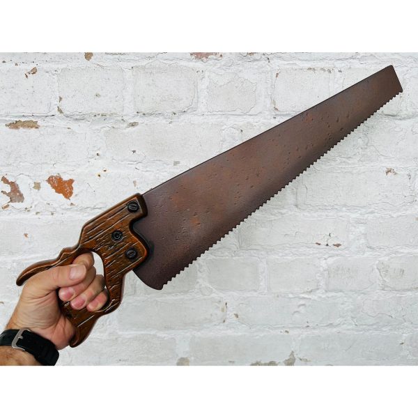 vintage hand saw prop weapon