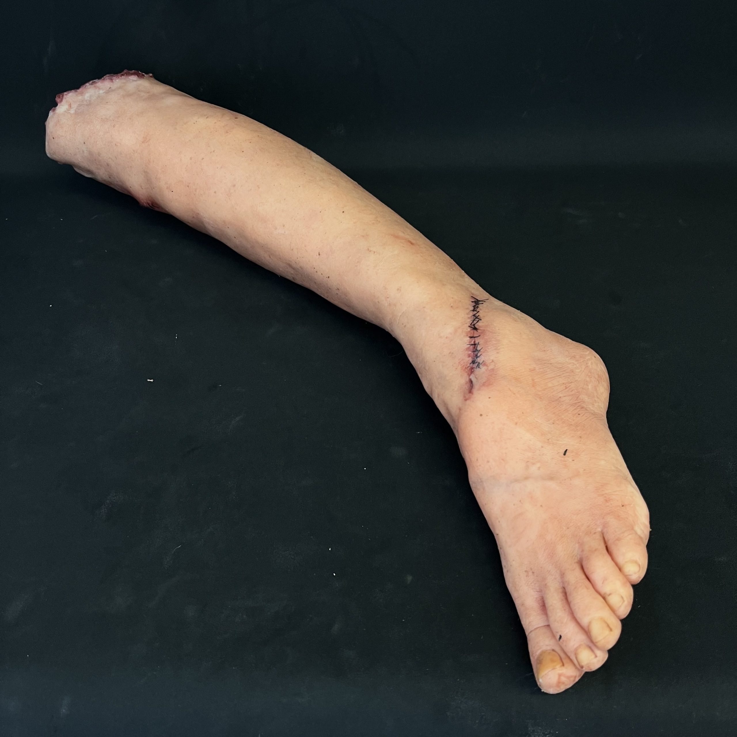 Silicone Severed Leg With Stitches - Female