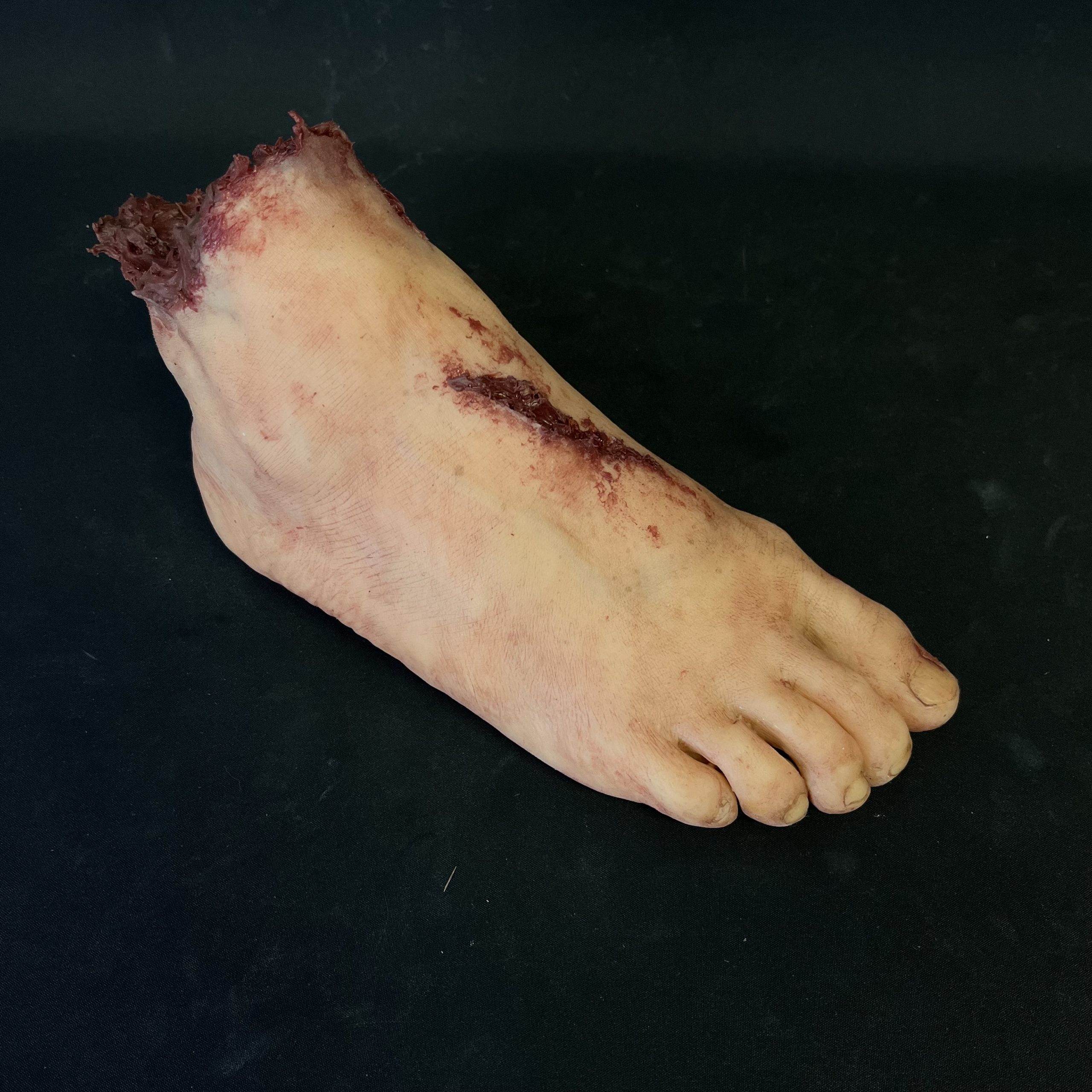 Silicone Severed Foot With Wounds - Male