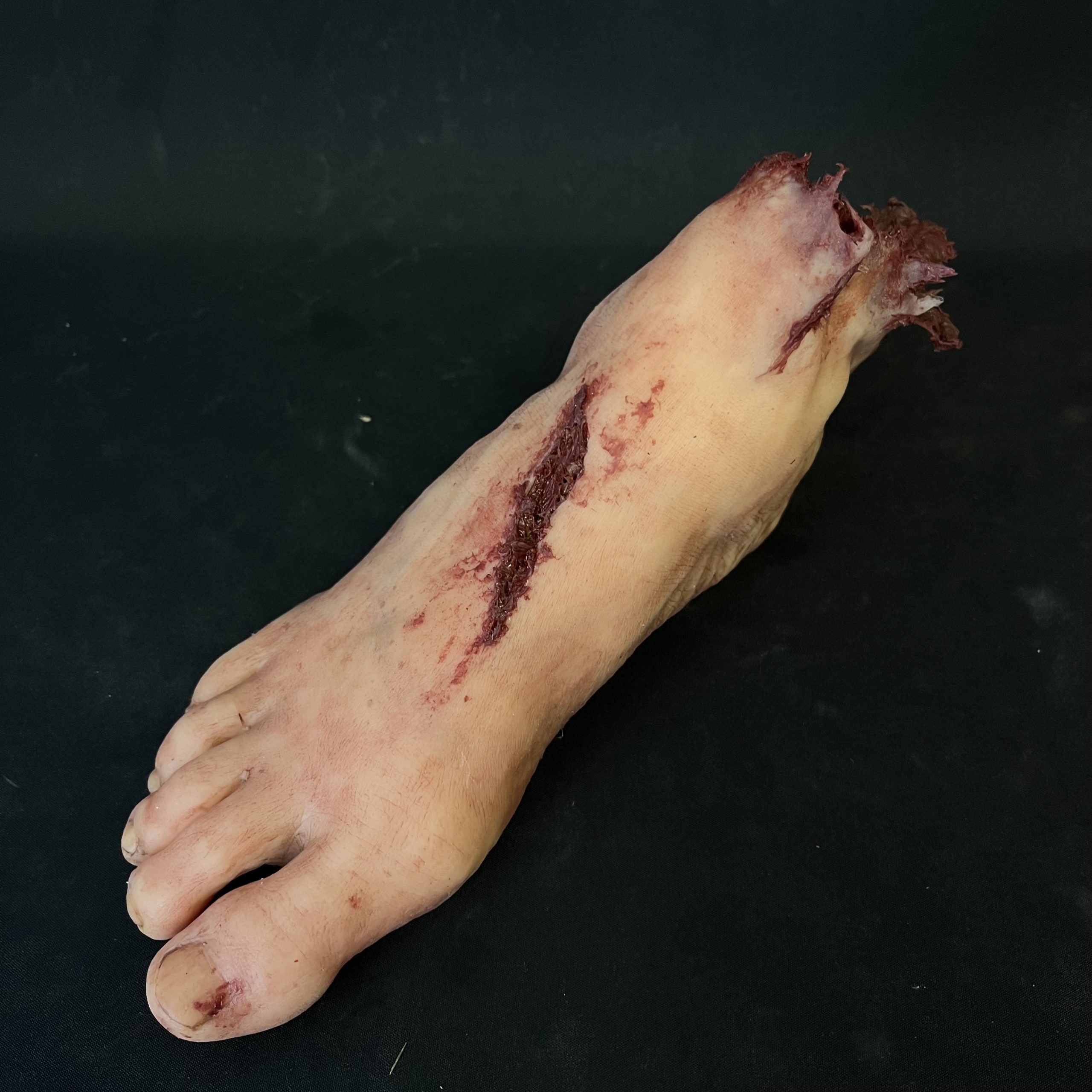 Silicone Severed Foot With Wounds - Male