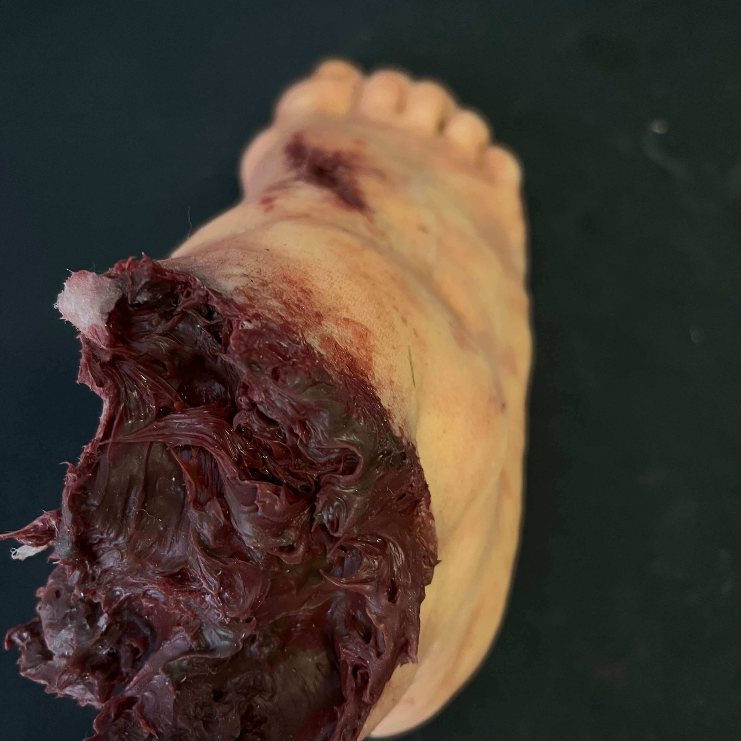 Silicone Severed Foot With Wounds - Male