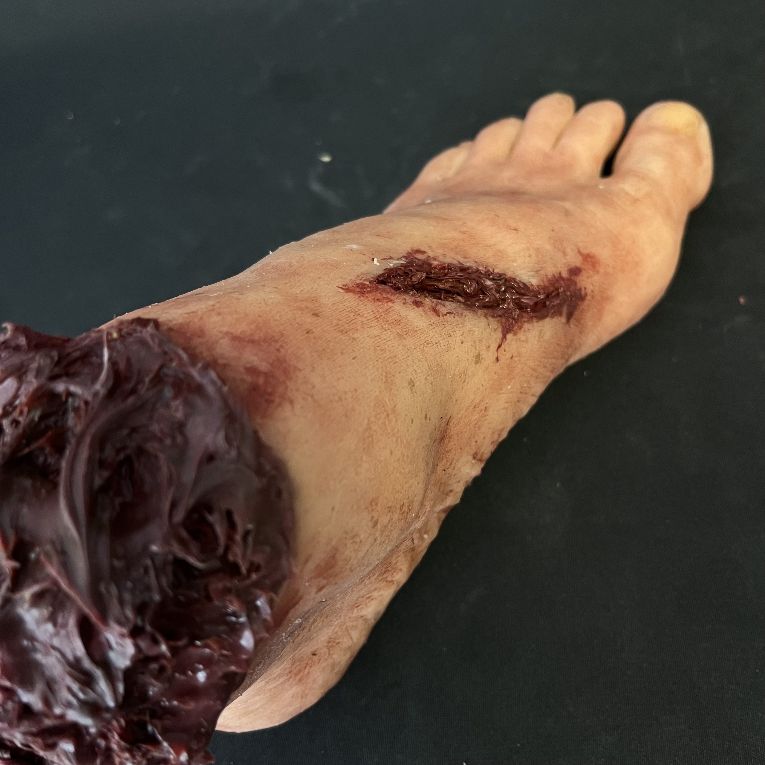 Silicone Severed Foot With Wounds - Male