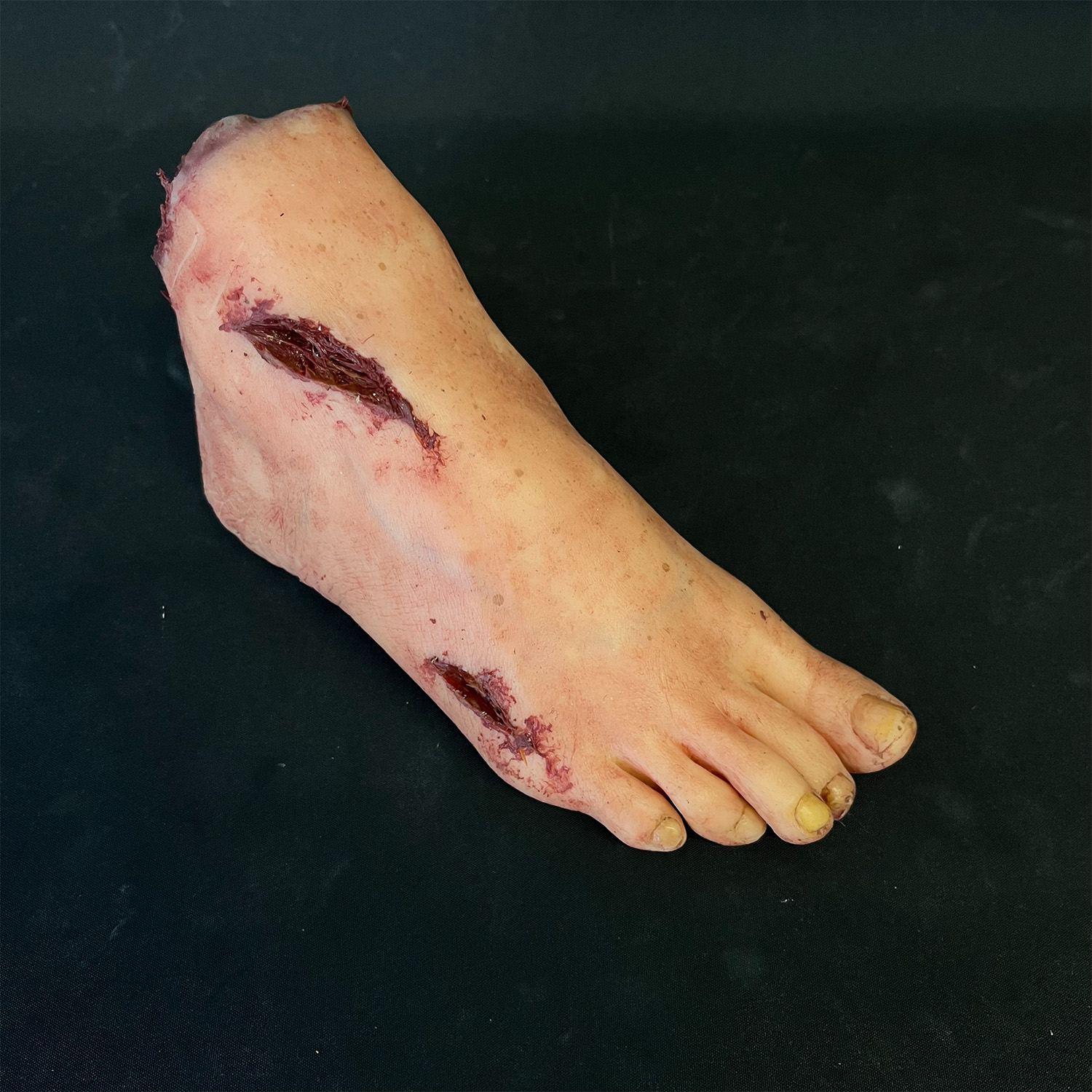 Silicone Severed Foot With Wounds - Female