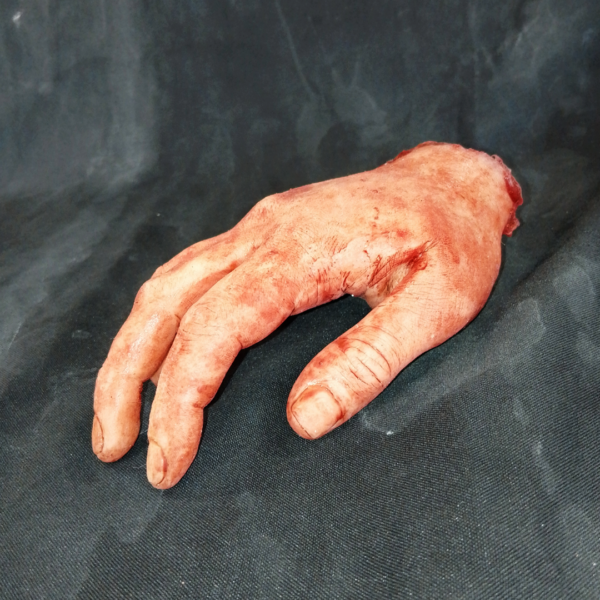 Weibliche abgetrennte Hand