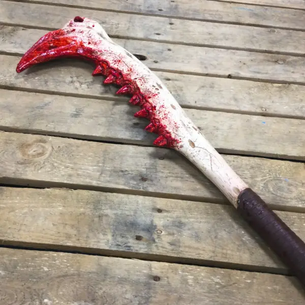 A PU foam weapon made from the large jaw of an animal.