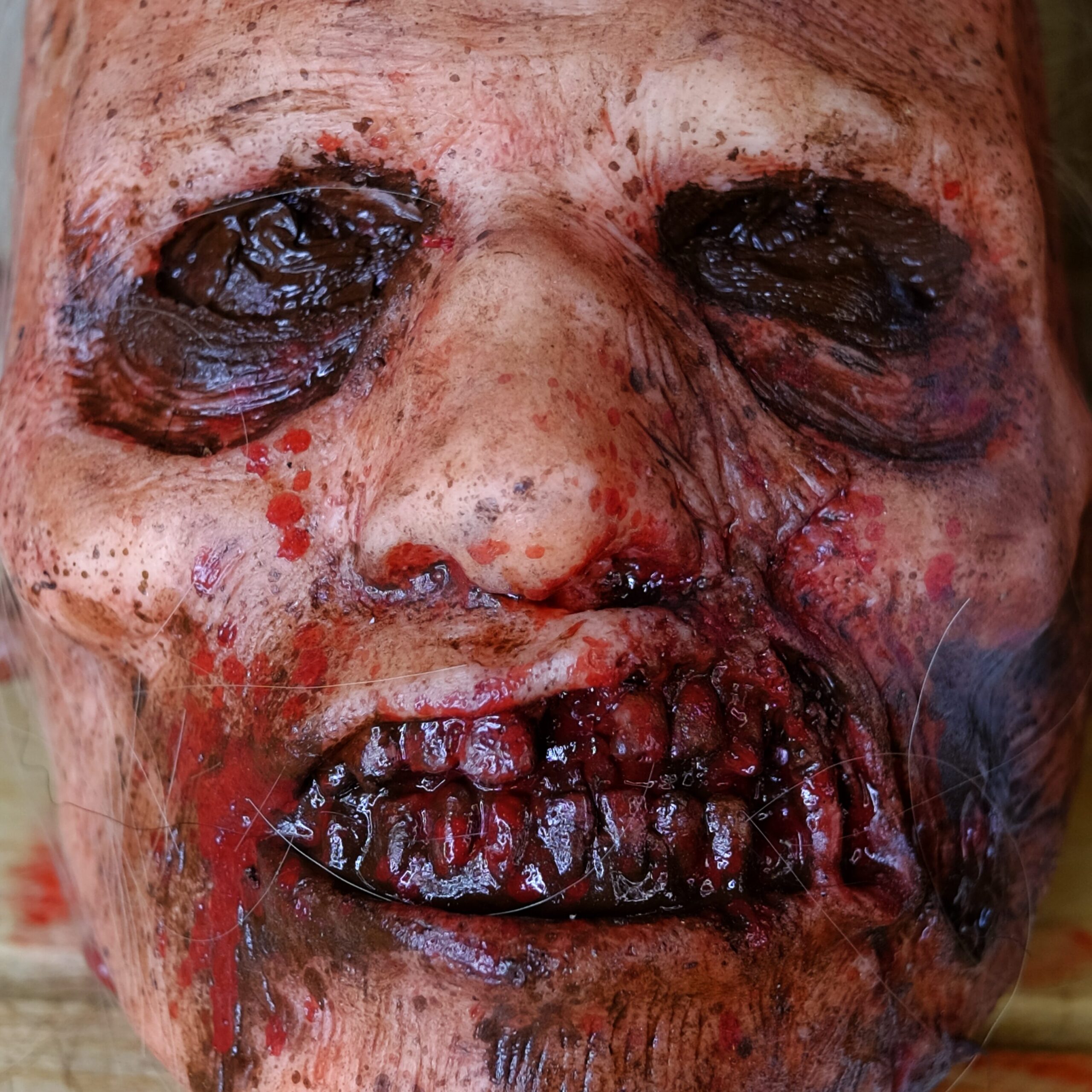 Realistic Severed Zombie Head - Grinz